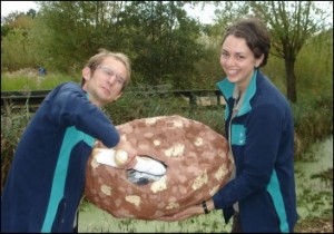 Paul and Shayna, WWT London Wetland Centre learning staff, with a giant pellet