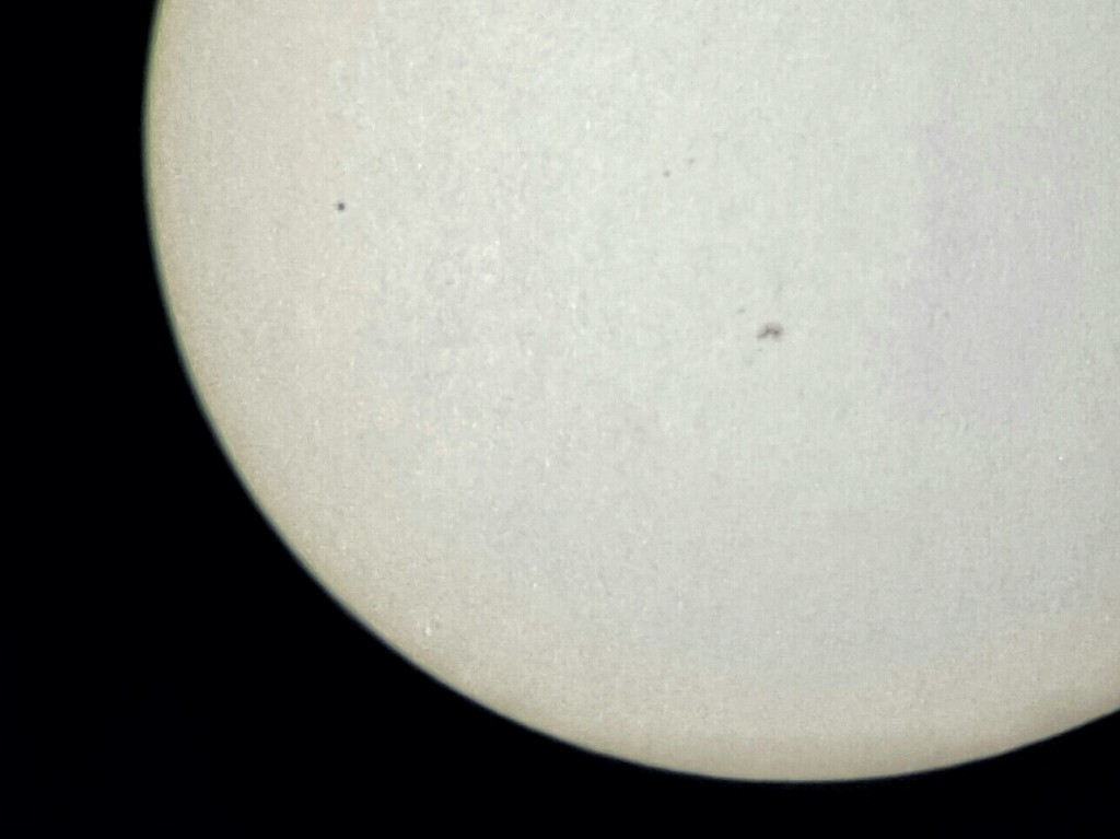 Mercury in front of the Sun (the 10 o'clockish dot)