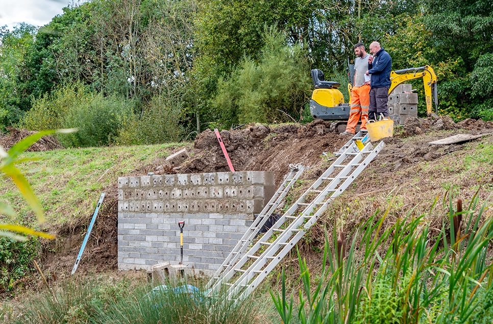 John Gowland standing above the sand martin bank whilst under construction