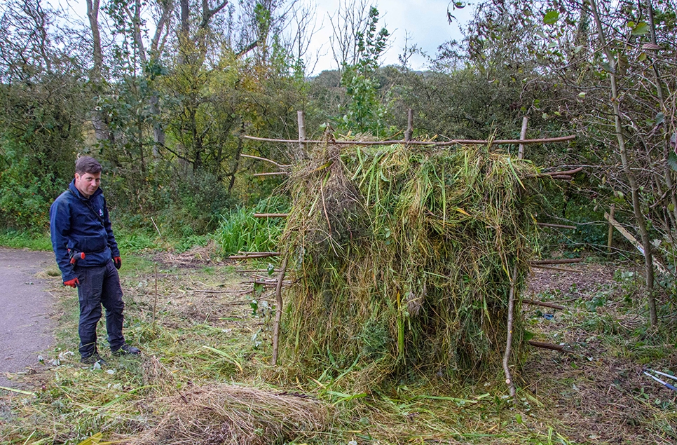 Matt setting up a habitat on site